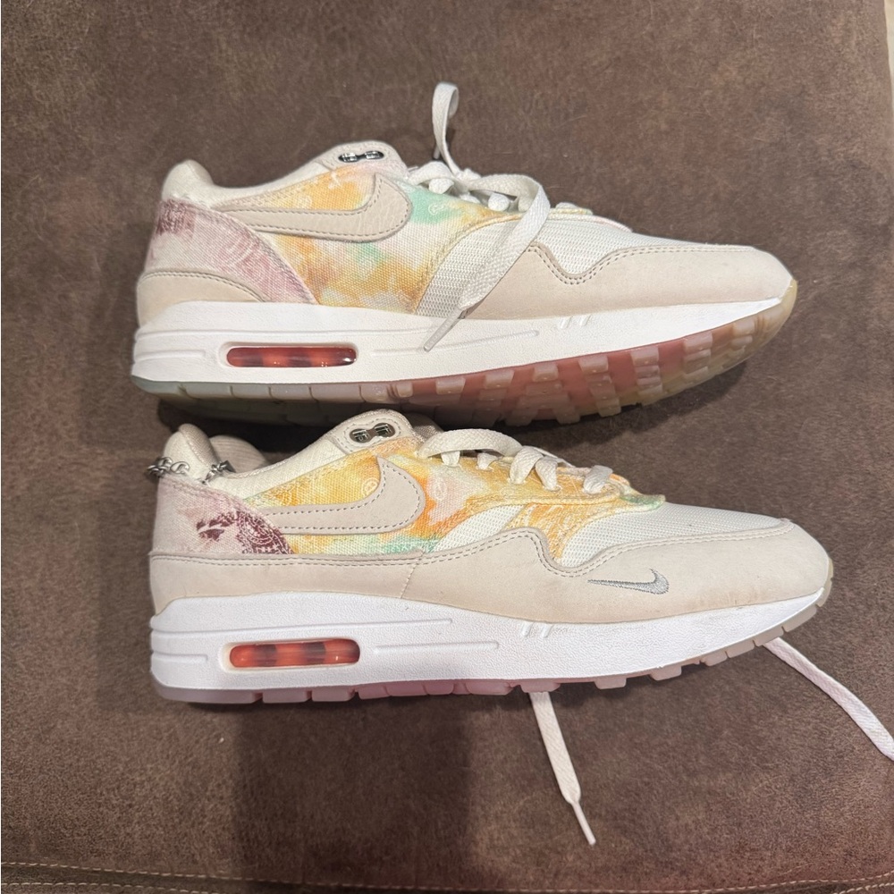 *SOLD* Nike sneakers with metal charms 9.5 Women’s. Super cute and colorful